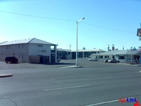 Built in 1957, the Desert Sands was considered a first-class establishment with a fancy roadside sign. Now it's in a rundown neighborhood, just a cheap place for drifters to hide out ... with a fancy vintage roadside sign. 