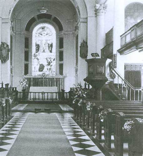 Old photos with strange blurs or shadows may be ghost manifestations, like the Ghost in the Choir Loft, a photograph that may contain evidence of paranormal energy.