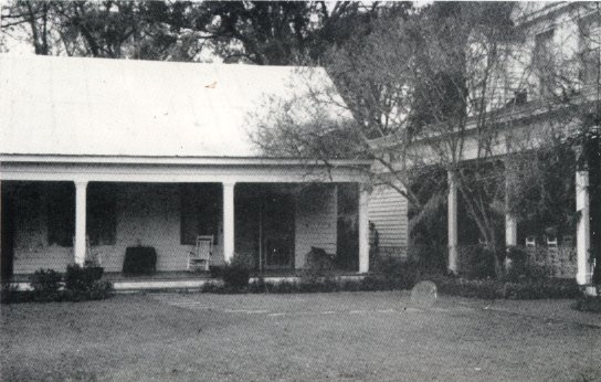 This photo is said to show Chloe, once a slave on the Myrtles Plantation, standing just to the right of the column in the center of the photo. Legend says Chloe became mistress of Myrtles' owner Judge Clarke Woodruff, poisoned his wife and children, and was hung from a tree on the property.