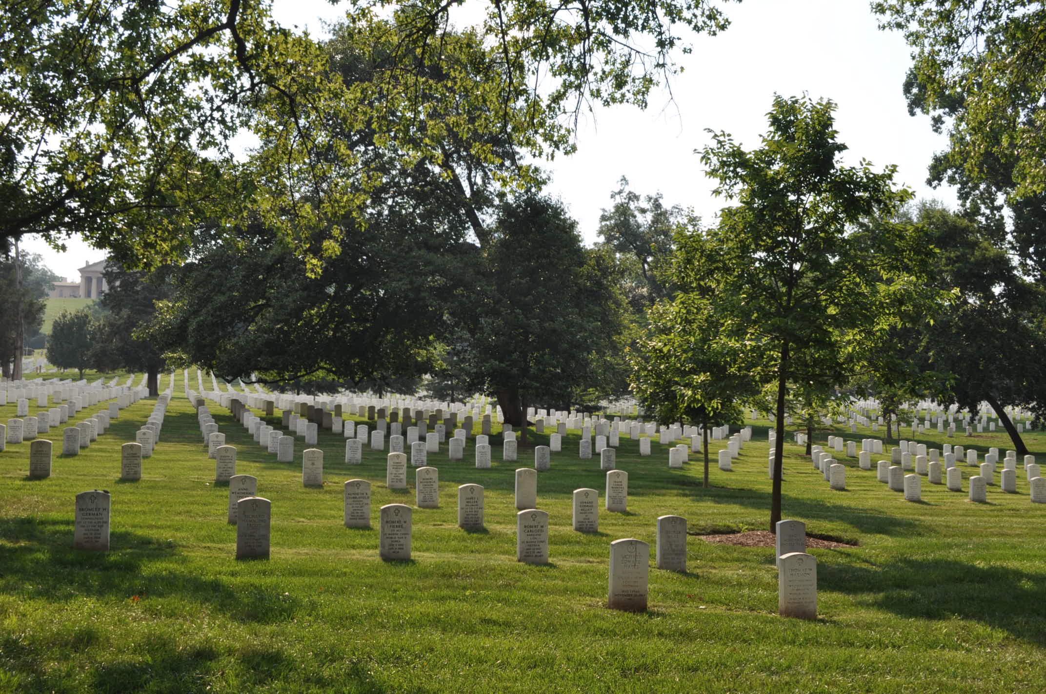 George Washington Parke Custis, grandson of Martha Washington, acquired the land that now is Arlington National Cemetery in 1802, and began construction of Arlington House (the name is ultimately derived from the village in England.